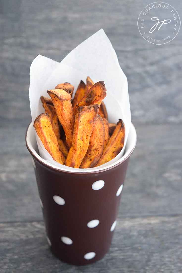 Finished Sweet Potato Fries Recipe, served in a polkadot cup.