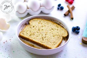 Step two shows a single slice of whole grain bread, laying in the milk mixture.