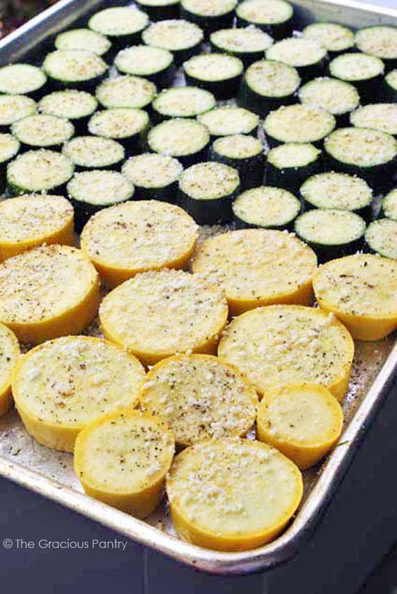 roasted squash and zucchini placed on a baking pan