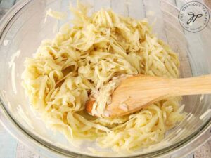 Put the potatoes in a mixing bowl and mix in your seasoning.