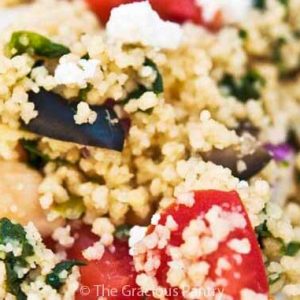 A closeup of Greek couscous salad.