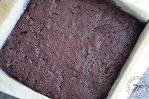 The baked brownies fresh out of the oven and still in the pan.