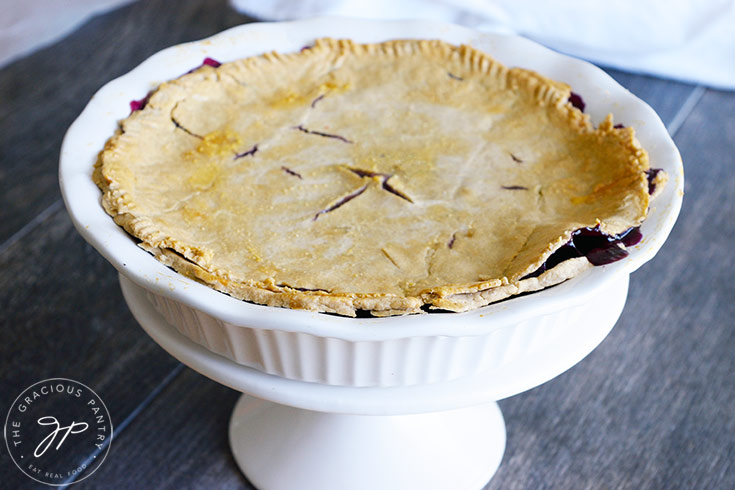 The finished blueberry pie, cooling in the pie pan.