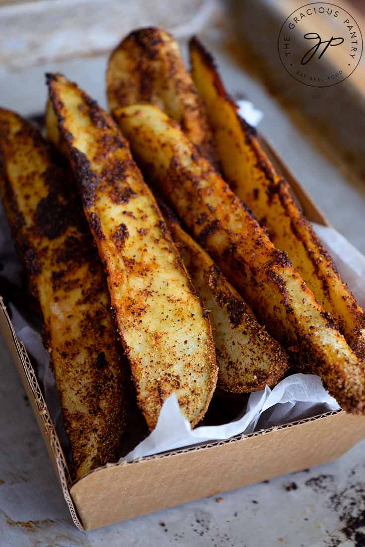 Delicious, golden brown Potato Wedges fresh out of the oven and ready to enjoy.