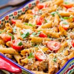 Baked Italian Ziti Recipe, finished baking, topped with fresh, cherry tomatoes, and ready to serve.