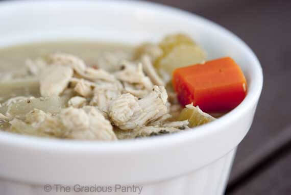 A white bowl filled with 
Leftover Turkey Soup