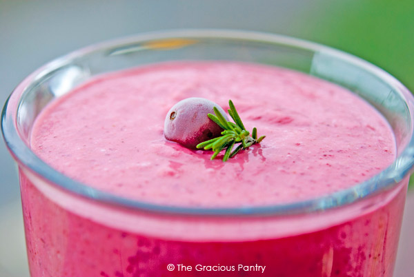 Cranberry Banana Smoothie in a glass mug.