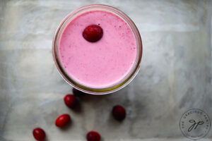 A Fresh Cranberry Smoothie Recipe in a glass.