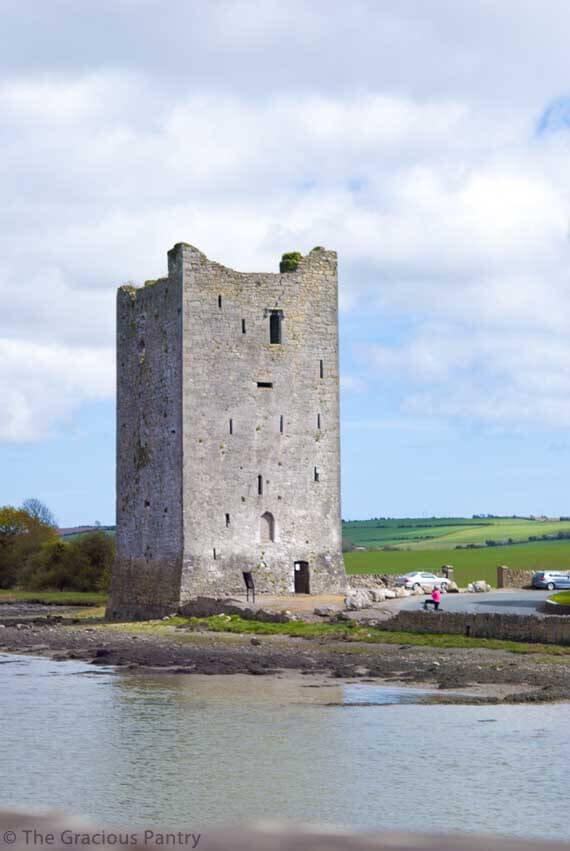 An old defense tower near a river in Ireland.