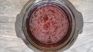 Cooking the cranberry sauce without the lid on to thicken it.