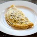 healthy one egg omelet on a white plate