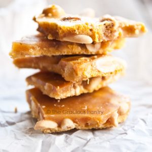 stack of homemade peanut brittle made from a peanut brittle recipe without corn syrup