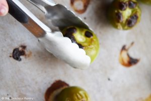 Roasting the tomatillas for this salsa verde recipe