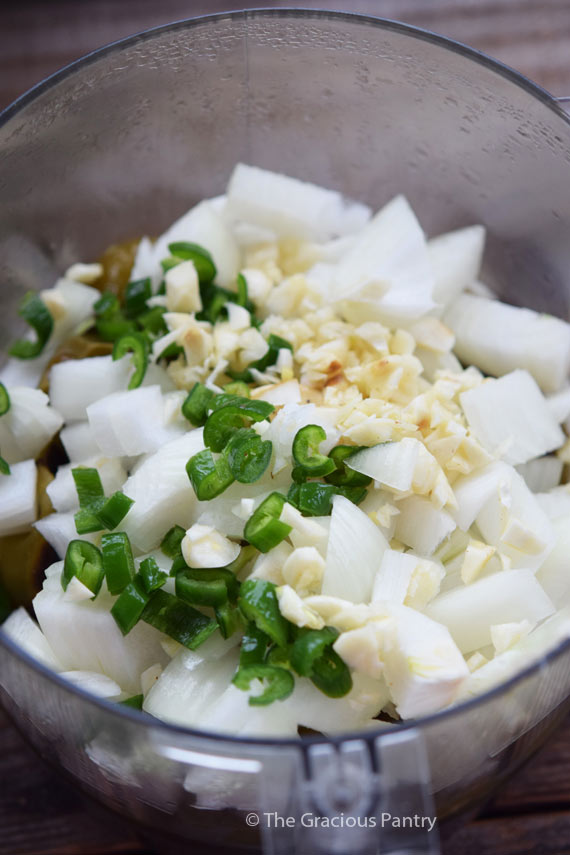 Salsa ingredients in a food processor.