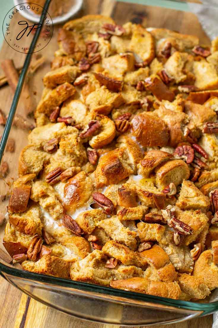 Golden brown crusted bread sits warm and inviting in it's just, baked casserole dish, ready to serve.