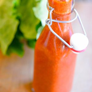 homemade Catalina Dressing in a clear glass bottle