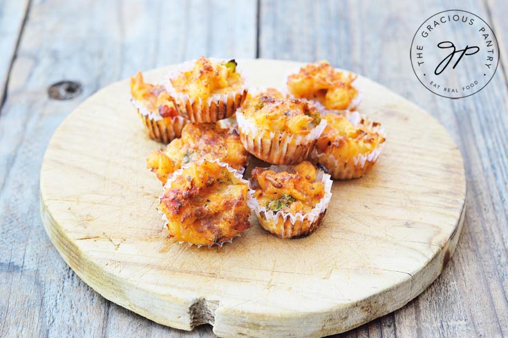 Spaghetti Cups on a round cutting board.