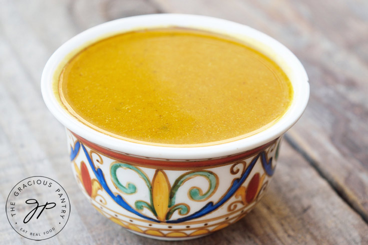 Quick & Easy Pumpkin Soup In a decorative bowl.