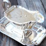 Giblet Gravy in a silver gravy boat.