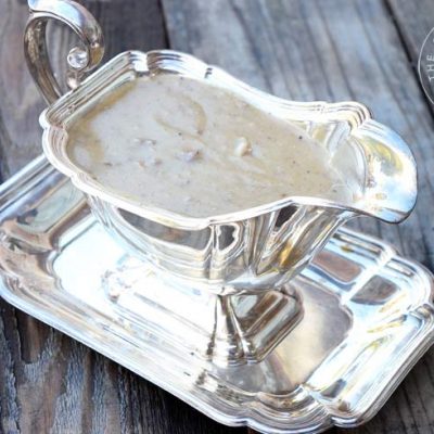 Giblet Gravy in a silver gravy boat.