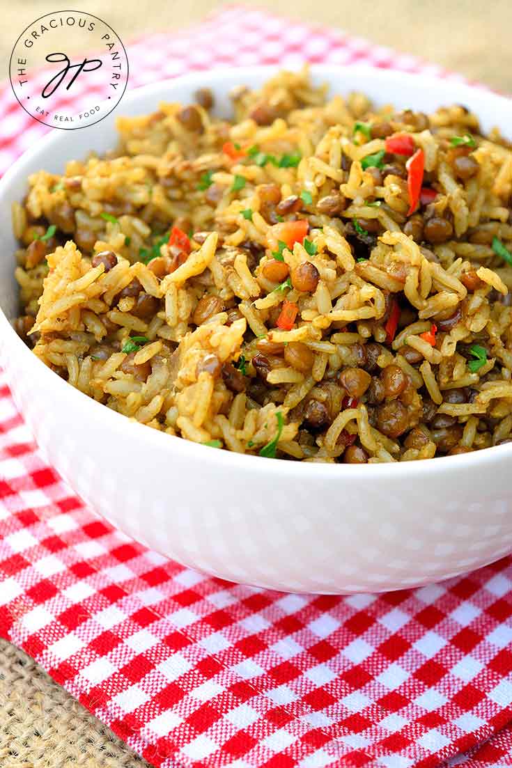 A white bowl filled with Lentils and Rice