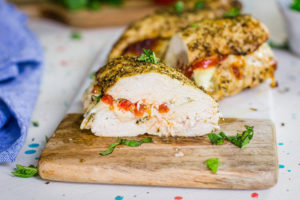 Garnish this finished Air Fryer Chicken Breasts Recipe with fresh basil, cut and serve.