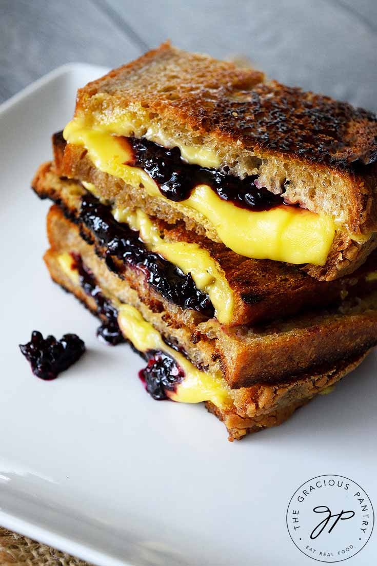 This Grilled Cheese Sandwich Recipe With Blackberries offers delicious, melty cheese with ooey-gooey blackberry compote. A heady and delicious combination!