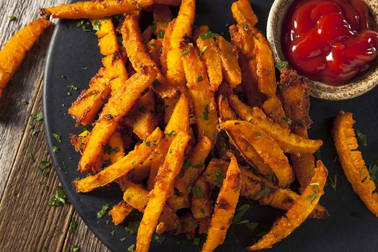Pumpkin french fries make perfect healthy halloween treats with a side of ketchup!