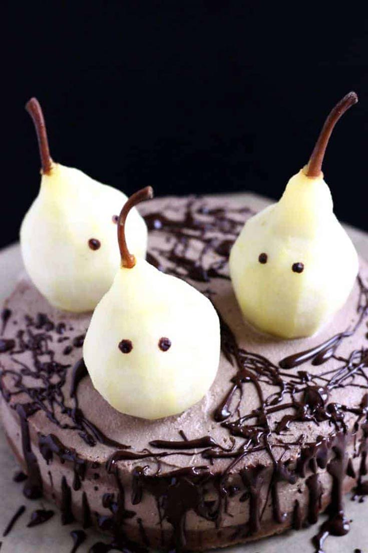 Ghost cake is vegan and has three darling ghosts decorating the top of the cake, made from pears.