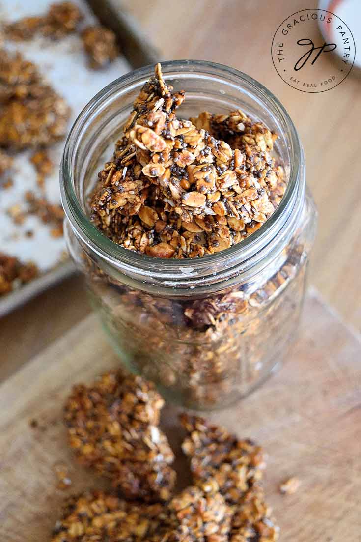 Looking from the top down into a canning jar filled with this Pumpkin Spice Granola Bark.