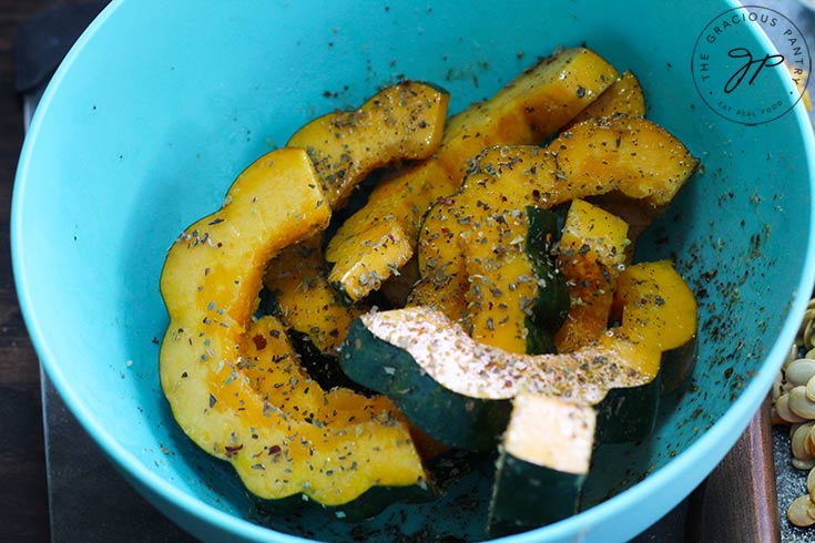 step five is to season your acorn squash slices.