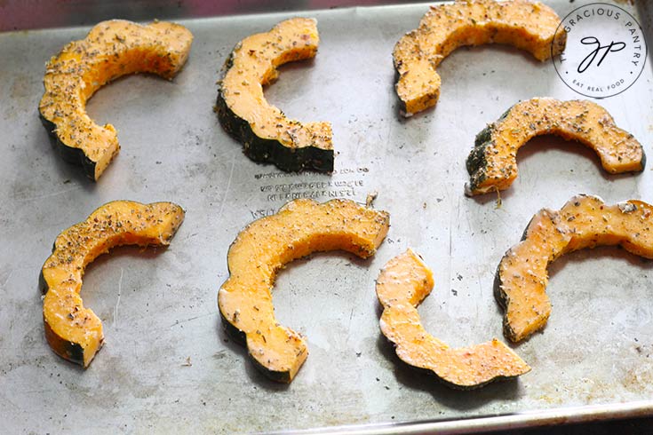 Step seven is to lay out the squash pieces on a baking sheet.