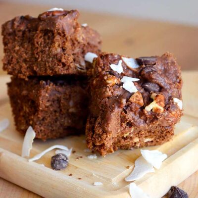 German Chocolate Brownies sitting in a table, ready to eat.