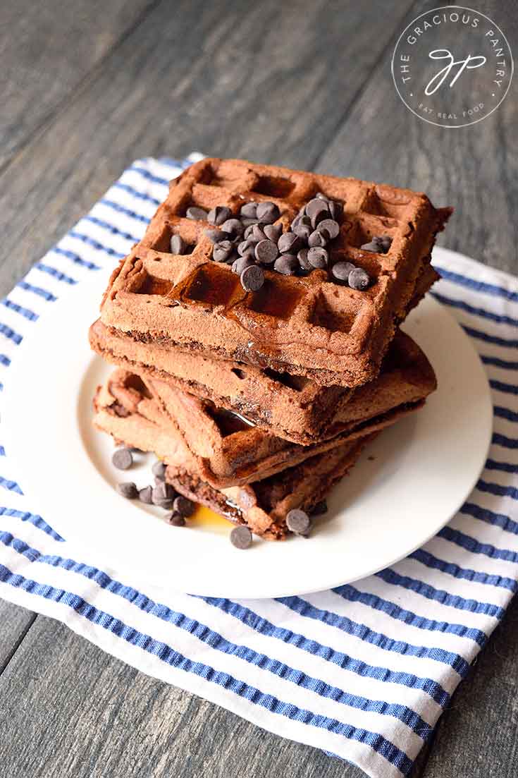 Looking down onto this stack of Vegan Chocolate Waffles topped with vegan chocolate chips.