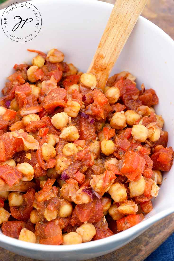 And overhead view looking down into the white serving bowl filled with this Indian Chickpea Salad.