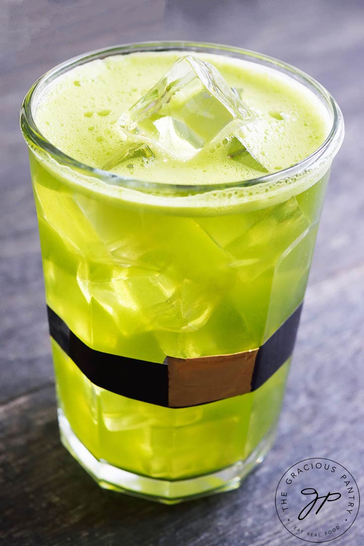 A glass of Green Lemonade sits