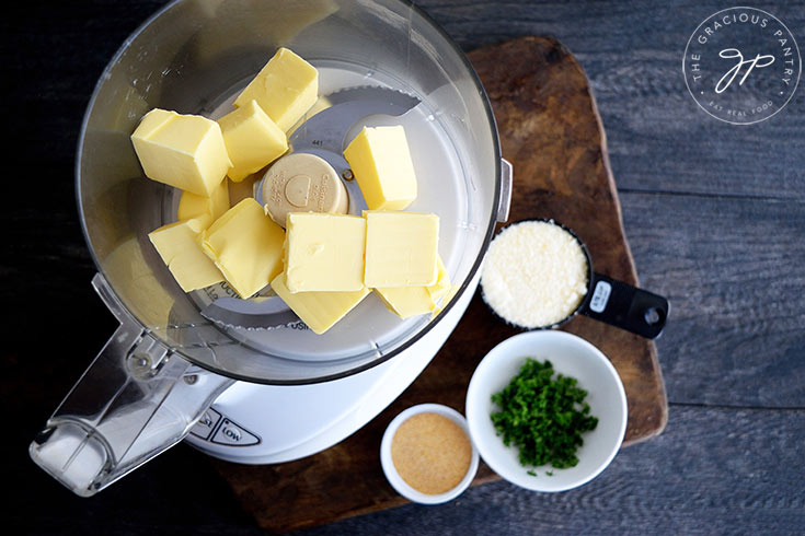 Step three is to prepare the garlic butter by placing all remaining ingredients in the food processor.