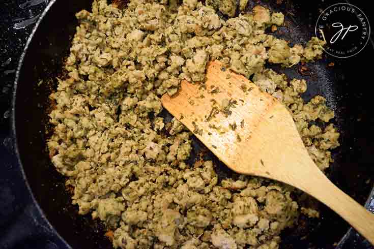 Cooked meat in a skillet.