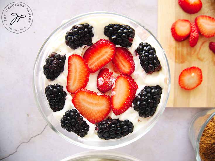 Fill in any spaces with berries.