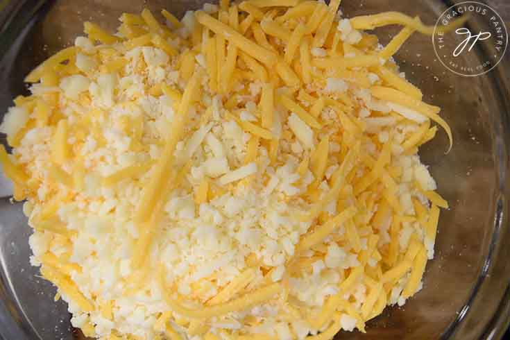 A cheese blend in a mixing bowl.