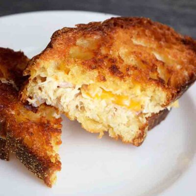 A delicious, golden brown Tuna Melt Recipe, just out of the oven and ready to eat.