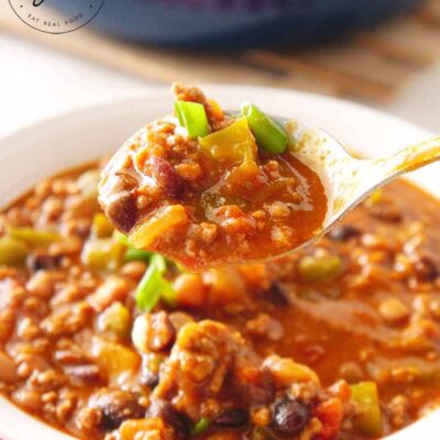 Beef chili on a spoon.