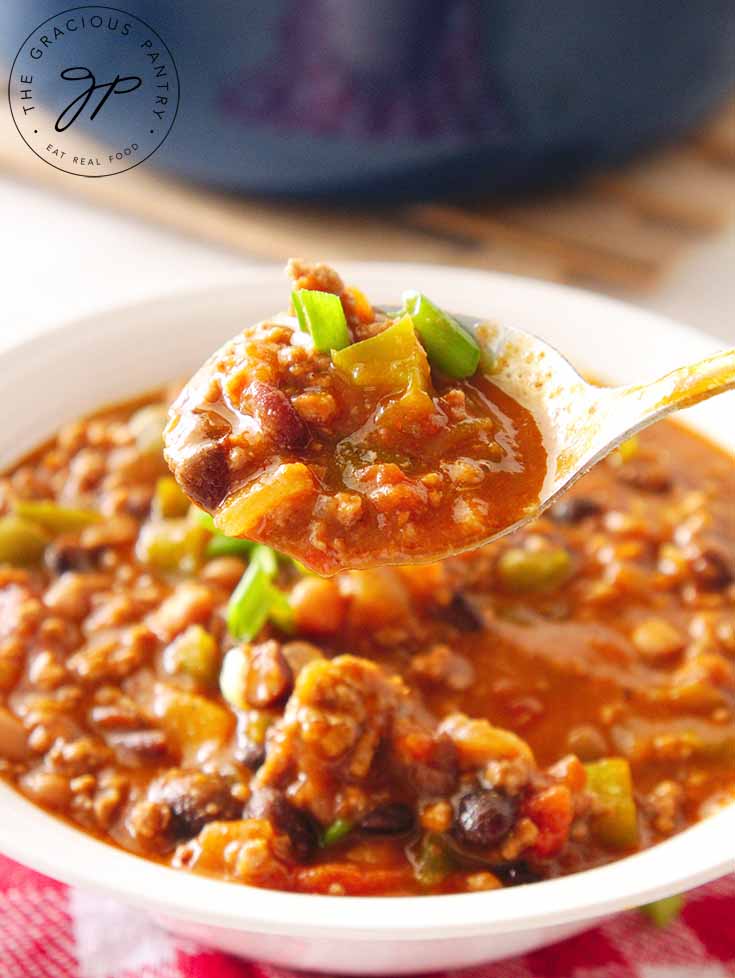 Beef chili on a spoon.
