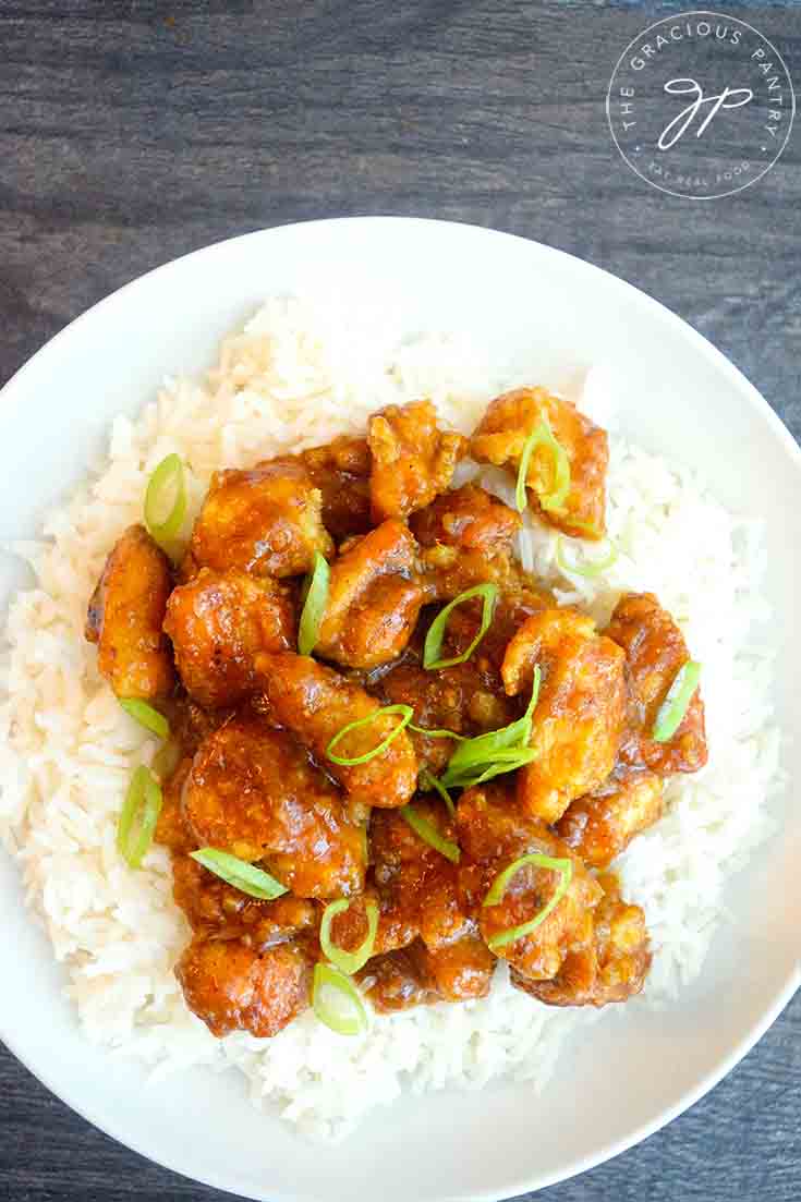 A overhead view of this Easy Orange Chicken atop a bed of rice.