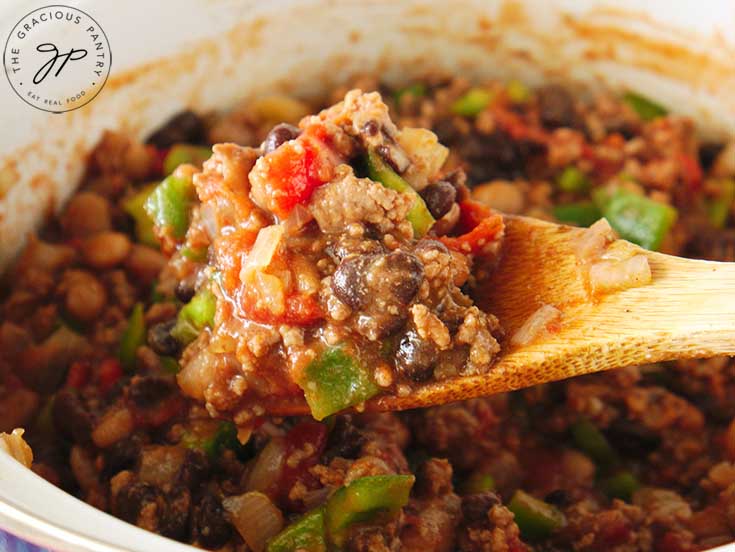 A close up of beef chili in a pot.