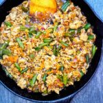 An overhead view of this Teriyaki Turkey Skillet Recipe shows bits of turkey, carrots and green beans all tossed with a delicious teriyaki sauce.