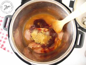 Then pour in the barbecue sauce, then broth and remaining spices.