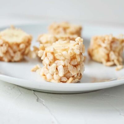 Banana Poppers on a white plate, ready to eat.