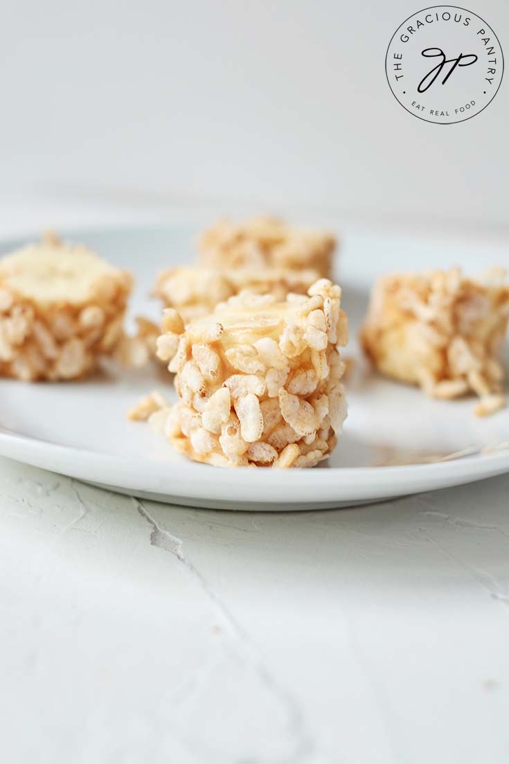 Banana Poppers on a white plate, ready to eat.