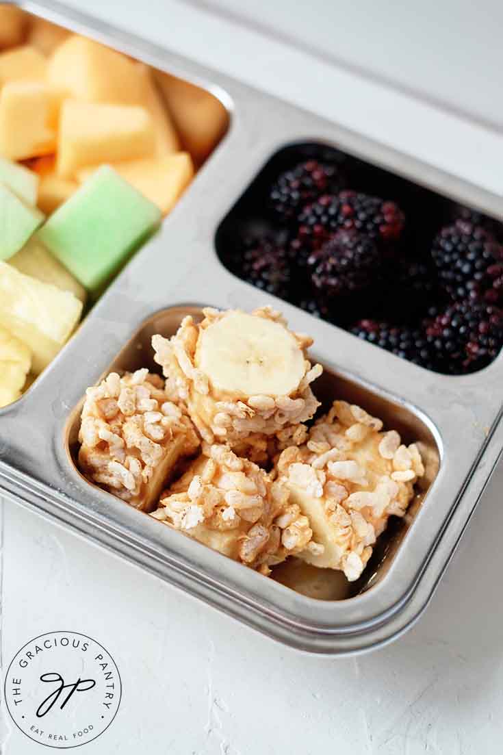 Banana poppers in a bento-style lunchbox.